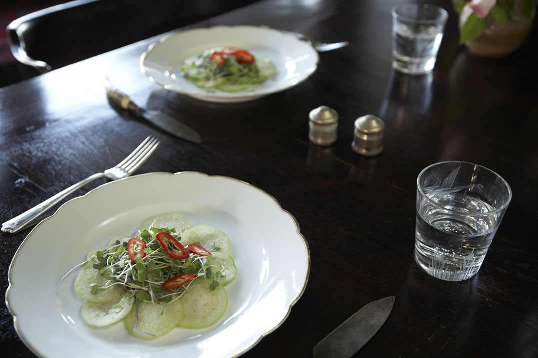 A place setting with a light first course
